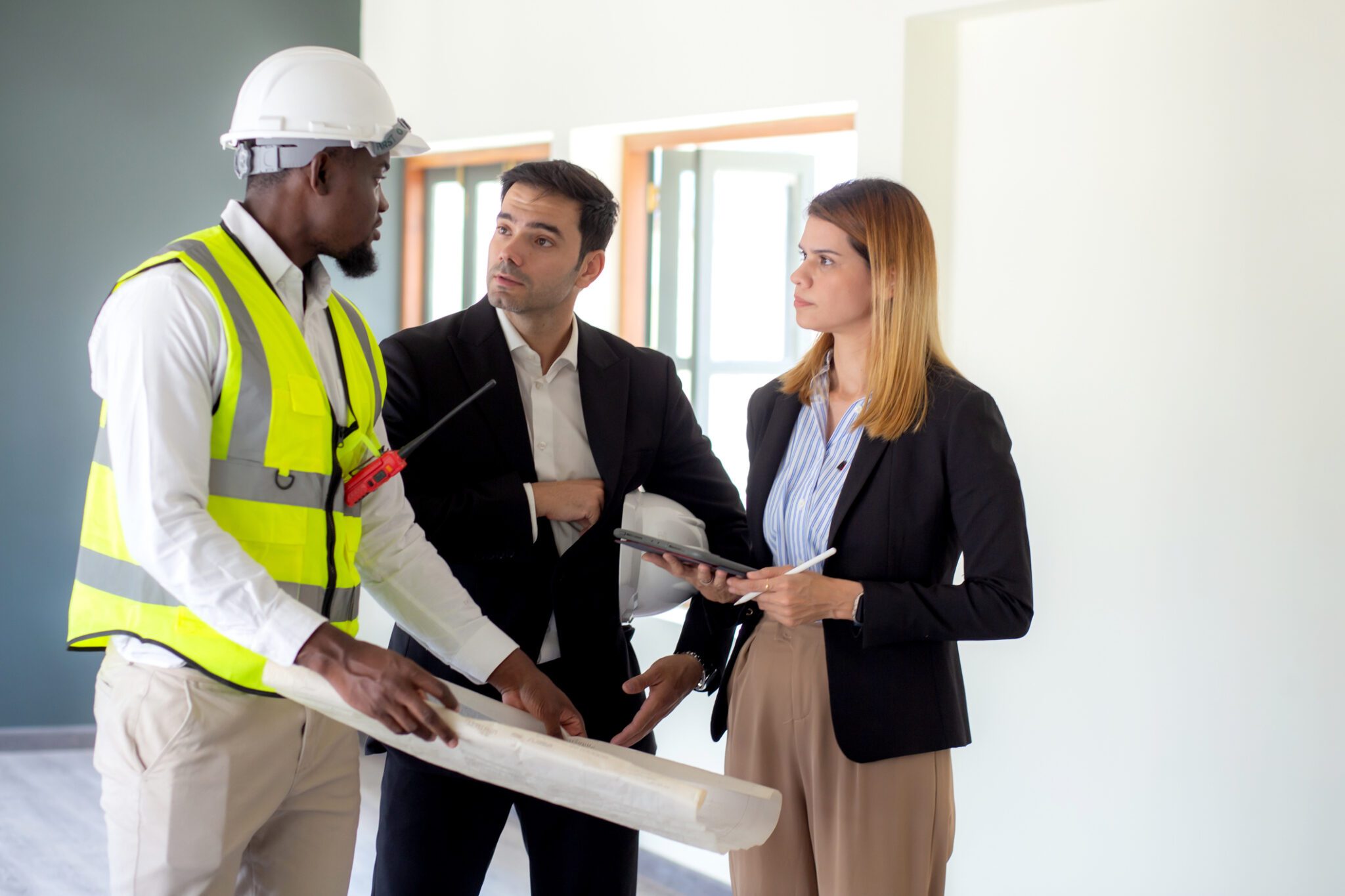 Construction meeting with architect and business professionals.